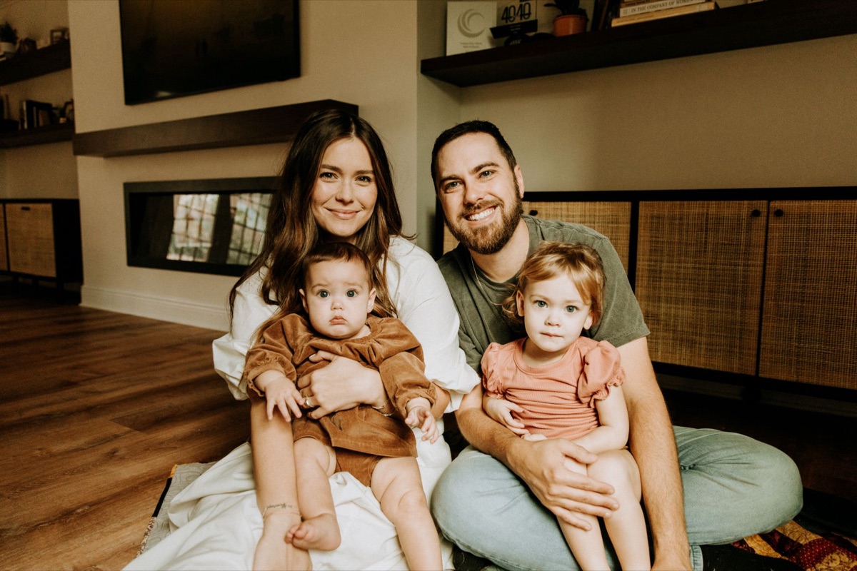 Family portrait of Aaron, his wife and their two daughters