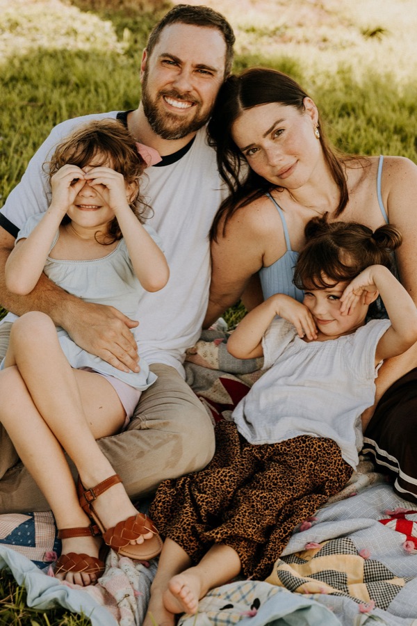 Aaron’s family on a picnic blanket